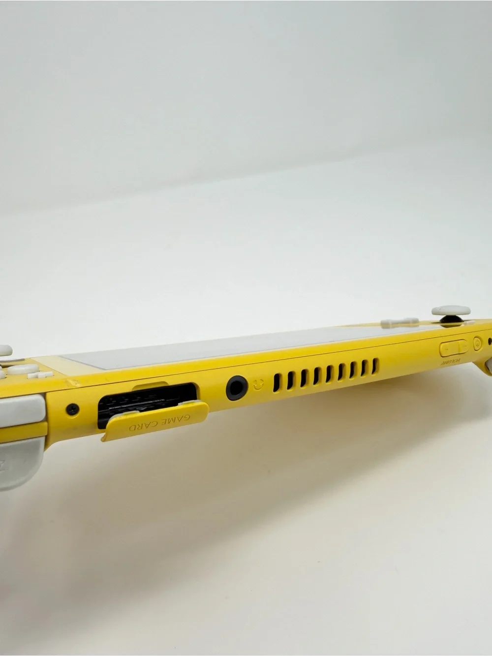Nintendo Switch Lite Yellow Handheld Gaming Console with White Buttons